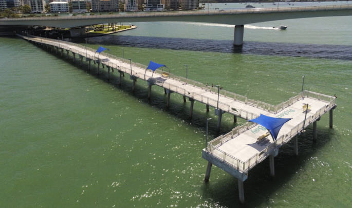 A picture containing water, outdoor, shore, boatAI-generated content may be incorrect.